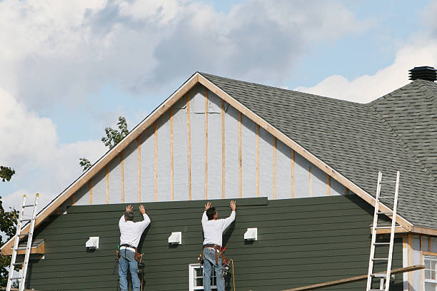Professional Siding Installation technician working in Ocean Beach, NY